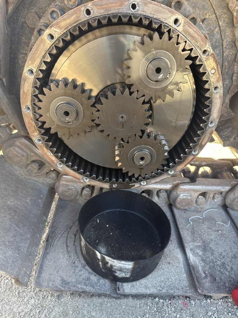 Caterpillar planetary gear assembly during rebuild