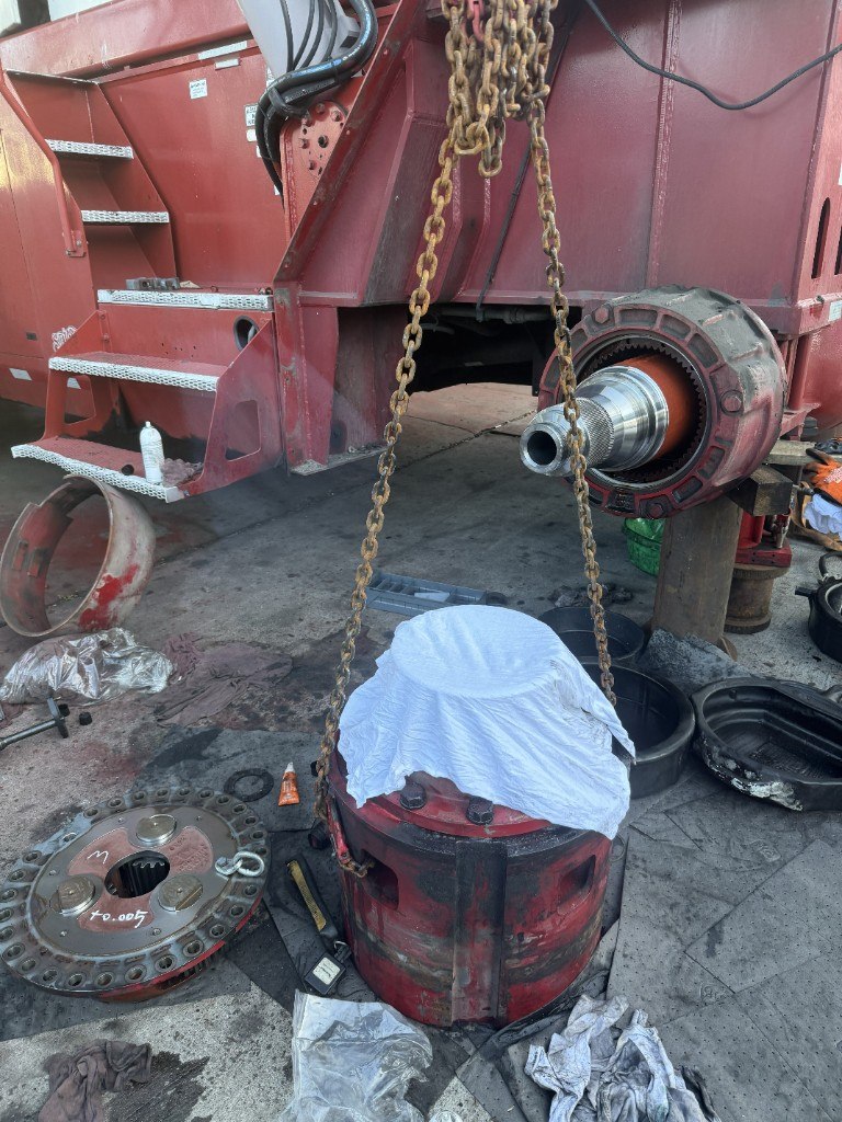 Heavy-duty component lifted during equipment repair
